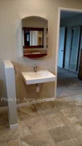 Roll Under wheelchair accessible sink in newly remodeled accessible bathroom